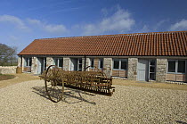 The self-catering bothies at the Avon Wildlife Trust Folly Farm Centre, Somerset, UK