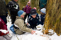 A group of Estonian school children in the woods learning about nature, Tartumaa, Estonia