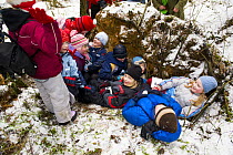 A group of Estonian school children in the woods pretending to be bears, Tartumaa, Estonia