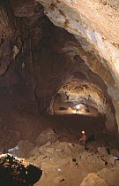 Potholer in underground cave system, Graller del Boixaguer, Serra del Montsec, Lleida, Spain, November 1995