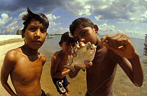 Children with Pacu fish, Port do Móz, Rio Tabajos, Amazon, Brazil, 1994
