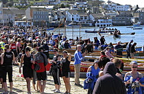 Crowds of rowers on Town Beach, St. Mary's, Isles of Scilly. 19th World Pilot Gig Championships, May 2008.