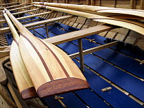 Oars and thwarts of Lyme Regis Gig Club's first boat ^Rebel^, Dorset, July 2008