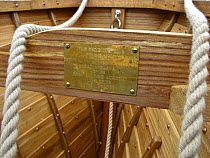 Plaque in the stern of Lyme Regis Gig Club's first boat "Rebel", Dorset, July 2008. It reads 'Lyme Regis Gig Club "Rebel" built by Gail McGarva of the the Boat Building Academy, Lyme Regis, June 29th...