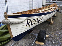 Lyme Regis Gig Club's first boat "Rebel" in temporary compound, Dorset, July 2008