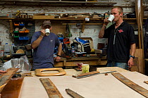 Shipwrights taking a tea break in Win Cnoops' Slipway Co-operative workshop. Underfall Yard, Bristol Floating Harbour, UK. July 2008