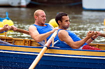 Bristol Pilot Gig Club's Men's crew practicing in their gig "Isambard" on Bristol's Floating Harbour, England, UK. July 2008, Model Released