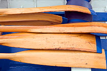 Oars on seats in Bristol Pilot Gig Club's "Isambard" on Bristol's Floating Harbour, England, UK    , July 2008