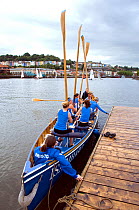 Bristol Pilot Gig Club's Ladies crew prepare for practice in their gig "Isambard" on Bristol's Floating Harbour, England, UK. July 2008, Model Released