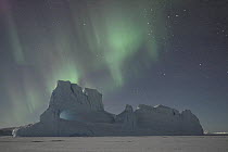 Southern lights, Aurora australis, over antarctic landscape, Antarctica