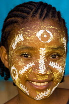 Girl with painted face from the tribe Antakarana, Nosy Tanikeli, North Madagascar.