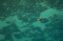 Aerial view of traditional Vezo fisherman in boat, Nosy Be, North Madagascar.