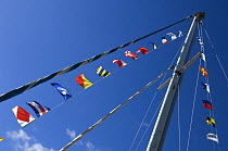 Nautical signal flags flying on sailing boat on Bristol Floating Harbour at the 2008 Harbour Festival, August