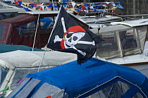 Skull and crossbones flag flying on cabin cruiser at the Bristol Harbour Festival, August 2008