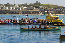 Crews applaud the Cattewater ladies in "Pilgrim" after the 19th World Pilot Gig Championships final, Isles of Scilly, May 2008