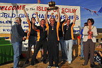 Mounts Bay men's crew celebrate their world title on the podium at the awards ceremony of the 19th World Pilot Gig Championships, Isles of Scilly, May 2008