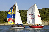 "A Day at the Races" and "St. David's Light" under sail during Round the Island Race, The British Classic Yacht Club Regatta, Cowes Classic Week, July 2008