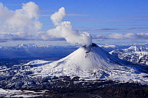 Karymsky volcano, one of the most active volcanoes on Kamchatka, it is constantly belching smoke and sometimes lava and ash, Kamchatka, Far East Russia