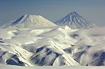 Snow-covered Kronotsky and Krashennikov volcanoes in April, Kronotsky Zapovednik, Kamchatka, Far East Russia