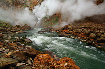 Water flowing over rapids in the Geyser River, Kronotsky Zapovednik, Kamchatka, Far East Russia