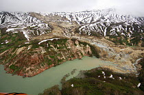 Aerial view of the landslide of June 3, 2007, which blocked part of Kamchatka's Valley of the Geysers, damning the Geyser River and creating a lake. This picture was taken on June 15, six days after t...