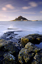 St Michael's Mount with causeway covered at high tide, from Marazion beach, Mounts Bay, Cornwall, UK. March 2008.