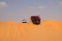 4x4 vehicle sand dune driving, Liwa, UAE