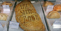 Enormous pasty for sale at Morris' Cornish Pasty shop, for the 2008 Funchal 500 Tall Ships Regatta, Falmouth, Cornwall, UK