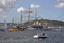 Tall ship "Pelican" sails past Pendennis Castle, flanked by a fleet of spectator boats at the Funchal 500 Tall Ships Regatta race day, Saturday 13th September 2008. Falmouth, Cornwall, UK