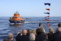 Spectators watching lifeboat from aboard "Enterprise III" ferry. Funchal 500 Tall Ships Regatta race day, Saturday 13th September 2008. Falmouth, Cornwall, UK