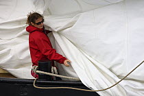 Sail work on schooner "Zuiderzee" at the Douarnenez Maritime Festival, France, July 2008