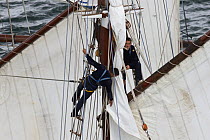 Sail work aboard schooner "L'Etoile" at Douarnenez Maritime Festival, France, July 2008