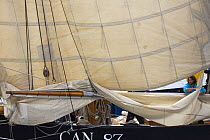 Sail work aboard Bisquine "La Cancalaise", Douarnenez Maritime Festival, France, July 2008