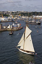 Cutter "Moonbeam" and Four masted barque "Kruzenshtern" entering port, Douarnenez Maritime Festival, France, July 2008