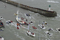Jean Luc van den Heede arriving at the finish line of the Global Challenge at Ouessant (Ushant), on his boat "Adrien" with a record time of 122 days, 14 hours, 3 minutes and 49 seconds. 11 March 2004.