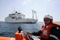 Crew of inflatable lifeboat on exercise, Mer d'Iroise sea, France, August 2005
