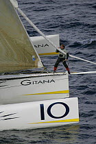 Man on bow of Gitana, Orma Multihull Championship, October 2005. ALL USES (including editorial) must be cleared with Bluegreen Pictures BEFORE downloading.