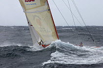 Vincent Riou aboard 60ft PRB "Imoca" amongst sea spray, April 2004
