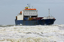 Container ship in a rough sea during storm, North Sea, Belgium. March 2008.