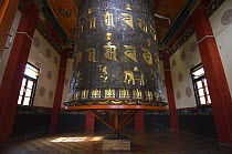 Buddhist giant prayer mill in Tashiding Monastery, Sikkim, India October 2007