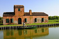 Traditional building beside the lagoon, Comacchio, Parco Delta del Po, NE Italy  2008