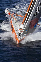 Monohull Open 60ft "PRB" with skipper Vincent Riou on bow, Vendee Globe 2008-2009. October 2008.
