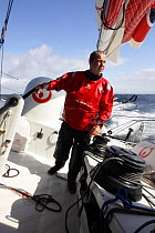 Skipper Roland Jourdain helming Monohull Open 60ft "Veolia Environment" during Vendee Globe 2008-2009, October 2008.
