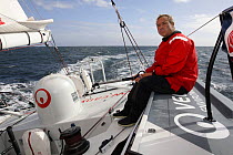 Skipper Roland Jourdain helming Monohull Open 60ft "Veolia Environment" during Vendee Globe 2008-2009, October 2008.