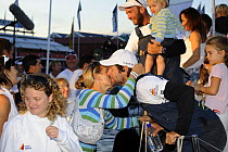 The crew of "Telefonica Black" greet family and friends after arriving in Cape Town in 8th (last) place with a broken rudder and bow sprit, November 2008. The 10th Volvo Ocean Race, 2008-2009. For EDI...