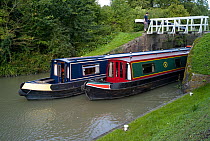 Narrow boats on the Kennet and Avon canal at Caen Hill, Wiltshire. September 2008
