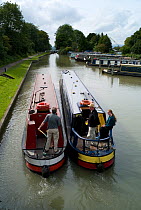 Narrow boats on the Kennet and Avon canal at Caen Hill, Wiltshire. September 2008