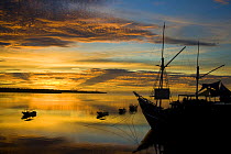 Sunrise viewed from the Manta Ray Bay Hotel on the island of Yap, Micronesia. September 2007. ^^^ The vessel in the foreground serves as the hotel's restaurant. It is a South Seas Schooner from Indone...