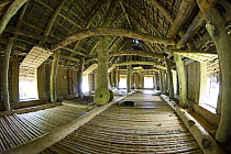 Men's house / falluw in a village on the Island of Yap, Micronesia. September 2007. ^^^ Fallows are constructed of large logs, bamboo, and thatch and are where visitors can spend the night, when they...