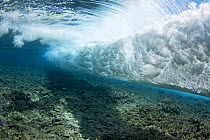 Surf crashes on the reef off the island of Yap in Micronesia. September 2007.
